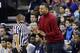 In this photo taken Feb. 8, 2017, Nathan Hale High School head coach and former NBA all-star Brandon Roy talks with an official during a Metro League basketball game, in Seattle. Roy's team features Michael Porter Jr., the nation's No. 1 high school recruit for the nation's No. 1 high school team. (AP Photo/Elaine Thompson)