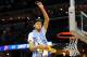 MEMPHIS, TN - MARCH 26: Justin Jackson #44 of the North Carolina Tar Heels cuts down the net after defeating the Kentucky Wildcats during the 2017 NCAA Men's Basketball Tournament South Regional at FedExForum on March 26, 2017 in Memphis, Tennessee. (Photo by Kevin C. Cox/Getty Images)