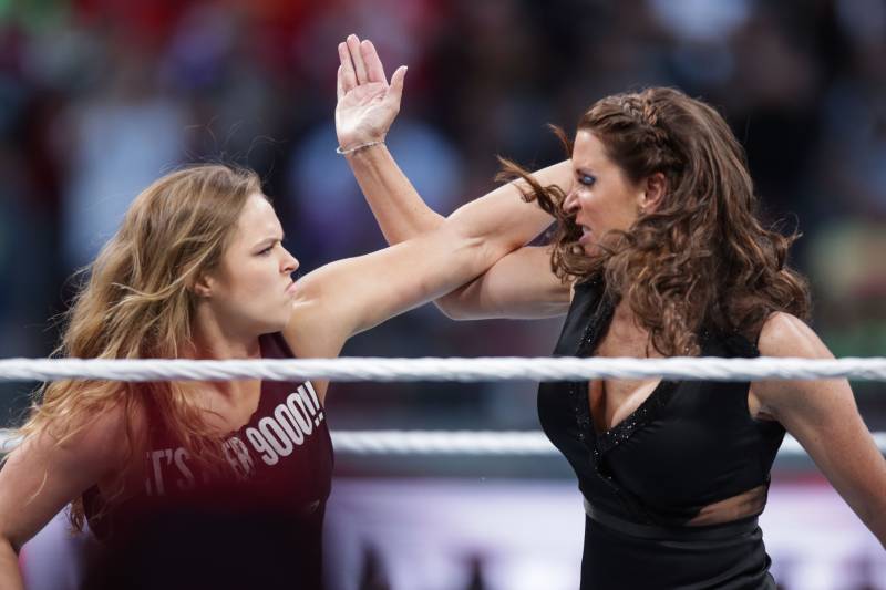 Ronda Rousey confronts Stephane McMahon at Wrestlemania XXXI, on Sunday, March 29, 2015 in Santa Clara, CA. 2015 marks the first year Wrestlemania will be held in the San Francisco Bay Area, being made available to viewers in 177 countries via the WWE Network. (Don Feria/AP Images for WWE)