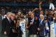 GLENDALE, AZ - APRIL 03: Joel Berry II #2 and head coach Roy Williams of the North Carolina Tar Heels celebrate with their team after defeating the Gonzaga Bulldogs as NCAA President Mark Emmert and TV personality Jim Nantz look on during the 2017 NCAA Men's Final Four National Championship game at University of Phoenix Stadium on April 3, 2017 in Glendale, Arizona. The Tar Heels defeated the Bulldogs 71-65. (Photo by Tom Pennington/Getty Images)