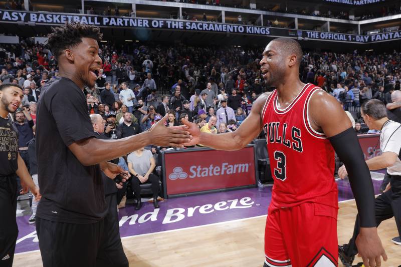 SACRAMENTO, CA - FEBRUARY 6: Jimmy Butler #21 and Dwyane Wade #3 of the Chicago Bulls high five during the game against the Sacramento Kings on February 6, 2017 at Golden 1 Center in Sacramento, California. NOTE TO USER: User expressly acknowledges and agrees that, by downloading and or using this photograph, User is consenting to the terms and conditions of the Getty Images Agreement. Mandatory Copyright Notice: Copyright 2017 NBAE (Photo by Rocky Widner/NBAE via Getty Images)