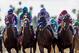 ARCADIA, CA - APRIL 08: The field battle for position as they approach the finish line of the Santa Anita Derby at Santa Anita Park on April 8, 2017 in Arcadia, California. Gormley (teal), ridden by Victor Espinoza, won the race. (Photo by Alex Evers/Eclipse Sportswire/Getty Images)