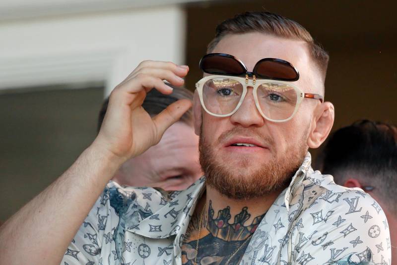 LIVERPOOL, UNITED KINGDOM - APRIL 08: (EMBARGOED FOR PUBLICATION IN UK NEWSPAPERS UNTIL 48 HOURS AFTER CREATE DATE AND TIME) Conor McGregor, current UFC Lightweight Champion, watches the racing as he attends day 3 'Grand National Day' of the Randox Health Grand National Festival at Aintree Racecourse on April 8, 2017 in Liverpool, England. (Photo by Max Mumby/Indigo/Getty Images)