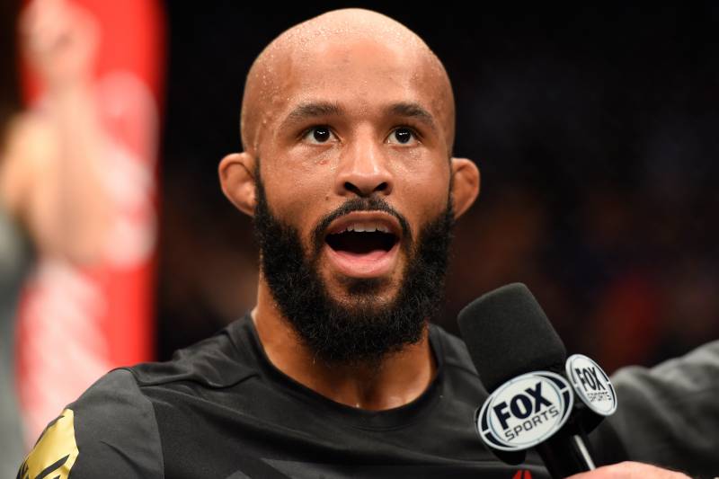 KANSAS CITY, MO - APRIL 15: Demetrious Johnson celebrates his submission victory over Wilson Reis of Brazil in their UFC flyweight fight during the UFC Fight Night event at Sprint Center on April 15, 2017 in Kansas City, Missouri. (Photo by Josh Hedges/Zuffa LLC/Zuffa LLC via Getty Images)