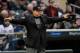 MINNEAPOLIS, MN - APRIL 03: Umpire Gerry Davis #12 calls Max Kepler #26 of the Minnesota Twins safe at first base against the Kansas City Royals after a replay review during the Opening Day game on April 3, 2017 at Target Field in Minneapolis, Minnesota. The Twins defeated the Royals 7-1. (Photo by Hannah Foslien/Getty Images)