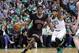 Chicago Bulls guard Rajon Rondo (9) drives towards the basket past Boston Celtics guard Isaiah Thomas (4) during the second quarter of a first-round NBA playoff basketball game in Boston, Tuesday, April 18, 2017. (AP Photo/Charles Krupa)