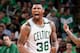 BOSTON, MA - APRIL 18: Marcus Smart #36 of the Boston Celtics celebrates after scoring against the Chicago Bulls during Game Two of the Eastern Conference Quarterfinals of the 2017 NBA Playoffs on April 18, 2017 at TD Garden in Boston, MA. NOTE TO USER: User expressly acknowledges and agrees that, by downloading and or using this Photograph, user is consenting to the terms and conditions of the Getty Images License Agreement. Mandatory Copyright Notice: Copyright 2017 NBAE (Photo by Brian Babineau/NBAE via Getty Images)
