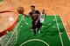 BOSTON, MA - APRIL 18: Jimmy Butler #21 of the Chicago Bulls drives to the basket against the Boston Celtics during Game Two of the Eastern Conference Quarterfinals of the 2017 NBA Playoffs on April 18, 2017 at TD Garden in Boston, MA. NOTE TO USER: User expressly acknowledges and agrees that, by downloading and or using this Photograph, user is consenting to the terms and conditions of the Getty Images License Agreement. Mandatory Copyright Notice: Copyright 2017 NBAE (Photo by Brian Babineau/NBAE via Getty Images)