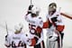 Ottawa Senators goalie Craig Anderson (41) is congratulated by Erik Karlsson (65) and Jean-Gabriel Pageau (44) after defeating the Boston Bruins 3-2 during an NHL hockey game in Boston, Tuesday, March 21, 2017. (AP Photo/Charles Krupa)