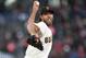 SAN FRANCISCO, CA - APRIL 13: Madison Bumgarner #40 of the San Francisco Giants pitches against the Colorado Rockies in the top of the first inning at AT&T Park on April 13, 2017 in San Francisco, California. (Photo by Thearon W. Henderson/Getty Images)