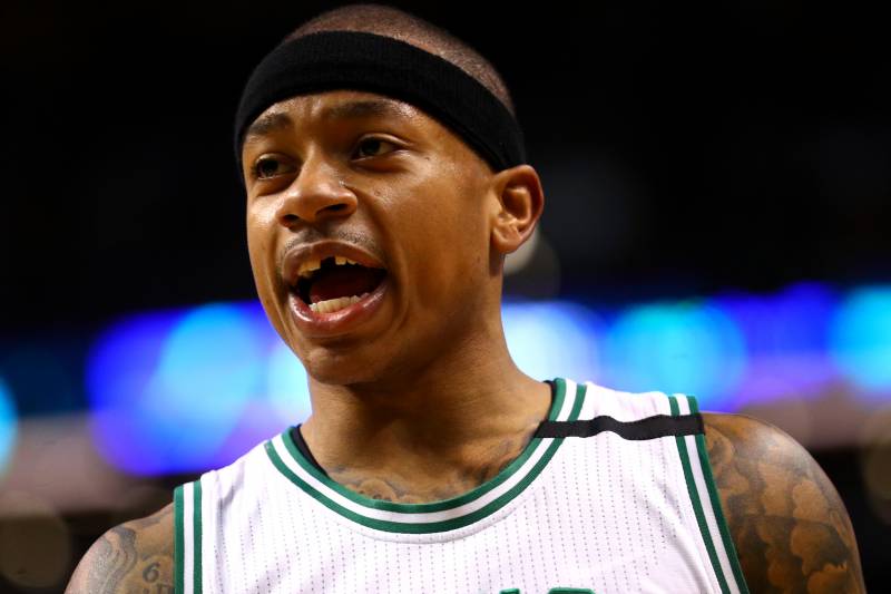 Thomas left in the second quarter after losing a front tooth, but came back just in time to help boost the Celtics past the Wizards. 