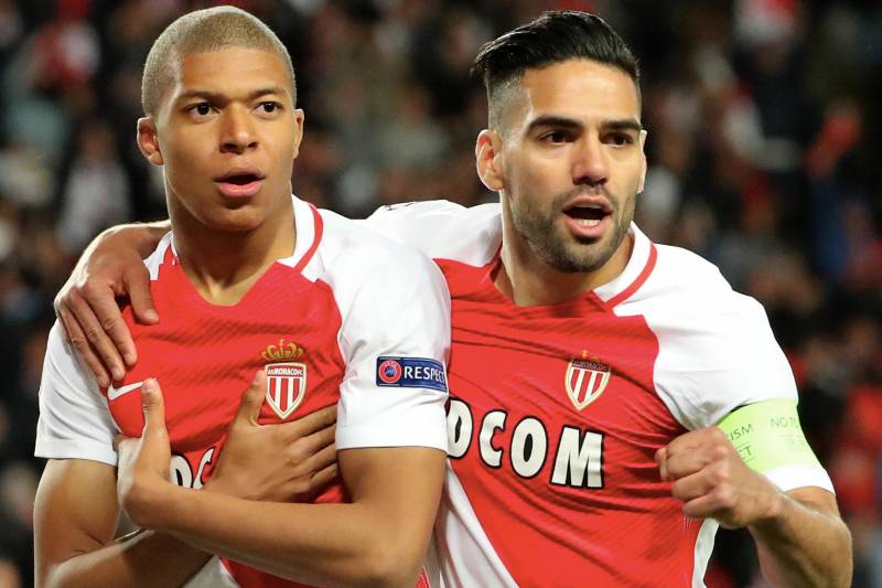 MONACO, MONACO - APRIL 19: Kylian Mbappe of AS Monaco celebrates his goal with captain Radamel Falcao during the UEFA Champions League Quarter Final second leg between AS Monaco and Borussia Dortmund at Stade Louis II on April 19, 2017 in Monaco, Monaco. (Photo by Xavier Laine/Getty Images )