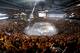 The crowd waves towels and cheers as lasers and spotlights swirl over the ice at Consol Energy Center before Game 5 of the NHL hockey Stanley Cup Eastern Conference finals between the Pittsburgh Penguins and the Tampa Bay Lightning, Sunday, May 22, 2016, in Pittsburgh. (AP Photo/Gene J. Puskar)