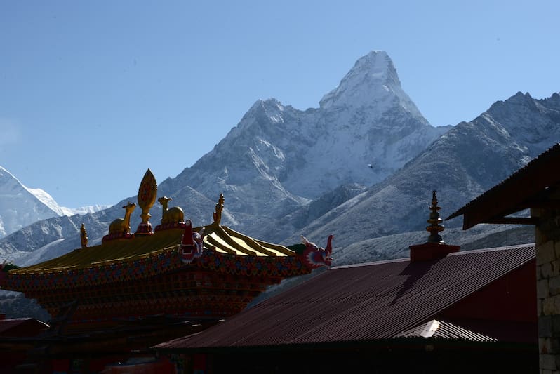 Tengboche Buddhist monastery gate and Mount Ama Dablam, with its 6,812 metre peak, is seen from Tengboche some 300kms north-east of Kathmandu on May 5, 2017. / AFP PHOTO / PRAKASH MATHEMA (Photo credit should read PRAKASH MATHEMA/AFP/Getty Images)