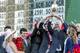 Todd Pletcher holds up the Kentucky Derby championship trophy.