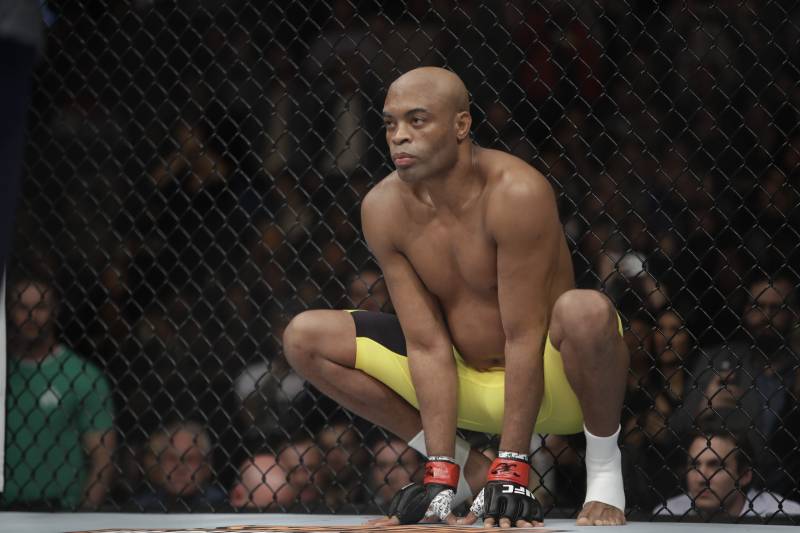 Anderson Silva, of Brazil, squats before a middleweight mixed martial arts bout against Derek Brunson at UFC 208 Saturday, Feb. 11, 2017, in New York. Silva won the fight. (AP Photo/Frank Franklin II)