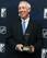 Boston College hockey coach Jerry York poses with his 2010 Lester Patrick Award trophy during a media availability in Boston, Wednesday, Oct. 27, 2010. (AP Photo/Michael Dwyer)