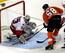 Carolina Hurricanes goalie Brian Boucher (33) stops a shot by Philadelphia Flyers' Jaromir Jagr (68) in the third period of an NHL hockey game, Saturday, Oct. 29, 2011, in Philadelphia. (AP Photo/H. Rumph, Jr.)