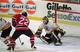 New Jersey Devils right wing Claude Lemieux (22) sets up one of his two goals in front of Boston Bruins goalie Blaine Lacher in the first period of their playoff series at the Boston Garden in Boston, Sunday, May 7, 1995. (AP Photo/Winslow Townson)