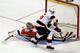 New Jersey Devils' Patrik Elias (26) scores against Philadelphia Flyers goalie Sergei Bobrovsky (35) during the shootout of an NHL hockey game Thursday, Nov. 3, 2011, in Philadelphia. The Devils won 4-3. (AP Photo/H. Rumph Jr.)
