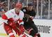 Chicago Blackhawks' Andrew Ladd, right, battles for the puck with Detroit Red Wings' Andreas Lilja during the second period of the NHL Winter Classic hockey game at Wrigley Field, Thursday, Jan. 1, 2009 in Chicago. The Red Wings dwon 6-4. (AP Photo/Nam