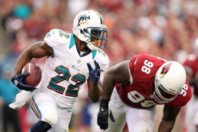 Miami Dolphins: 3 Ways Reggie Bush Will Exploit the Titans' Uninspiring Defense