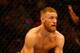 BOSTON, MA - AUGUST 17: Conor McGregor waits to start the featherweight bout against Max Holloway at TD Garden on August 17, 2013 in Boston, Massachusetts. (Photo by Jared Wickerham/Getty Images)