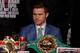 Boxer Saul 'Canelo' Alvarez from Mexico looks on as England's Amir Khan speaks during their final press conference at the MGM Grand in Las Vegas, Nevada on May 4, 2016 .
The boxers will fight for the WBC Middleweight title on May 7, 2016 at the T-Mobile