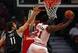 CHICAGO, IL - MAY 02: Jimmy Butler #21 of the Chicago Bulls shoots past Brook Lopez #11 of the Brooklyn Nets in Game Six of the Eastern Conference Quarterfinals during the 2013 NBA Playoffs at the United Center on May 2, 2013 in Chicago, Illinois. The Net