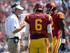 Kiffin talking to his quarterback and tight end.