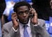 The disassociation between Michigan and its former players is over, but it may not mean much to Chris Webber.