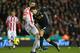 One-man team: Suarez goes on another of his mazy dribbles.