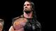 Seth Rollins with his tag title belt (from WWE.com)