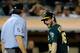 Angel Hernandez and Josh Reddick.