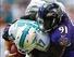Oct 6, 2013; Miami Gardens, FL, USA; Baltimore Ravens outside linebacker Courtney Upshaw (91) sacks Miami Dolphins quarterback Ryan Tannehill (17) in the first quarter at Sun Life Stadium. Mandatory Credit: Robert Mayer-USA TODAY Sports