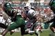 Crawford finds his way into the end zone for Miami's first touchdown.
