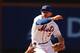 Omar Quintanilla completes a double play.