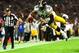 Le'Veon Bell soared in his NFL debut, returning from a foot sprain with a pair of touchdowns.