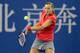 Petra Kvitova prepares to hit a backhand at the China Open.