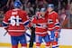 Lars Eller (right) celebrates one of his two opening-night goals.