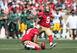Phil Dawson attempts a kick against the Packers.