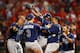 Evan Longoria joins the celebration around Fernando Rodney after beating the Cleveland Indians.