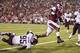 Julien Obioha attempts to make a tackle against Arkansas.