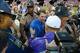 Les Miles and Will Muschamp shake hands after the Gators defeated the Tigers 14-6 in the Swamp.