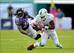Mike Wallace can't wrangle in a pass from Ryan Tannehill during the Dolphins' loss to the Ravens in Week 5.