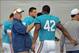 Sherman at the Dolphins' 2013 training camp talking with FB/TE Charles Clay.