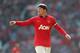 Even United fans have to admire Rooney with one eye closed.