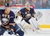 Christian Ehrhoff is on an island by himself while trying to help Ryan Miller