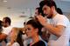 Stylists get players ready for the drawing ceremony.