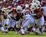 Malcolm Brown bulldozed his way to 120 rushing yards against the Sooners.